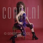 Penney de Jager (Date Uknown) at studio in Amsterdam.

[keywords]Posed, Full Length, Eyecontact, Smiling, Chair[/keywords]